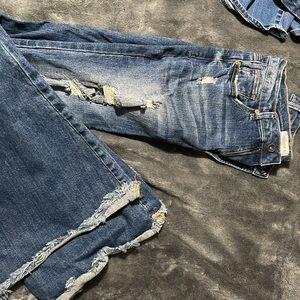 Distressed Blue Denim Jeans